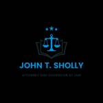 John T Sholly